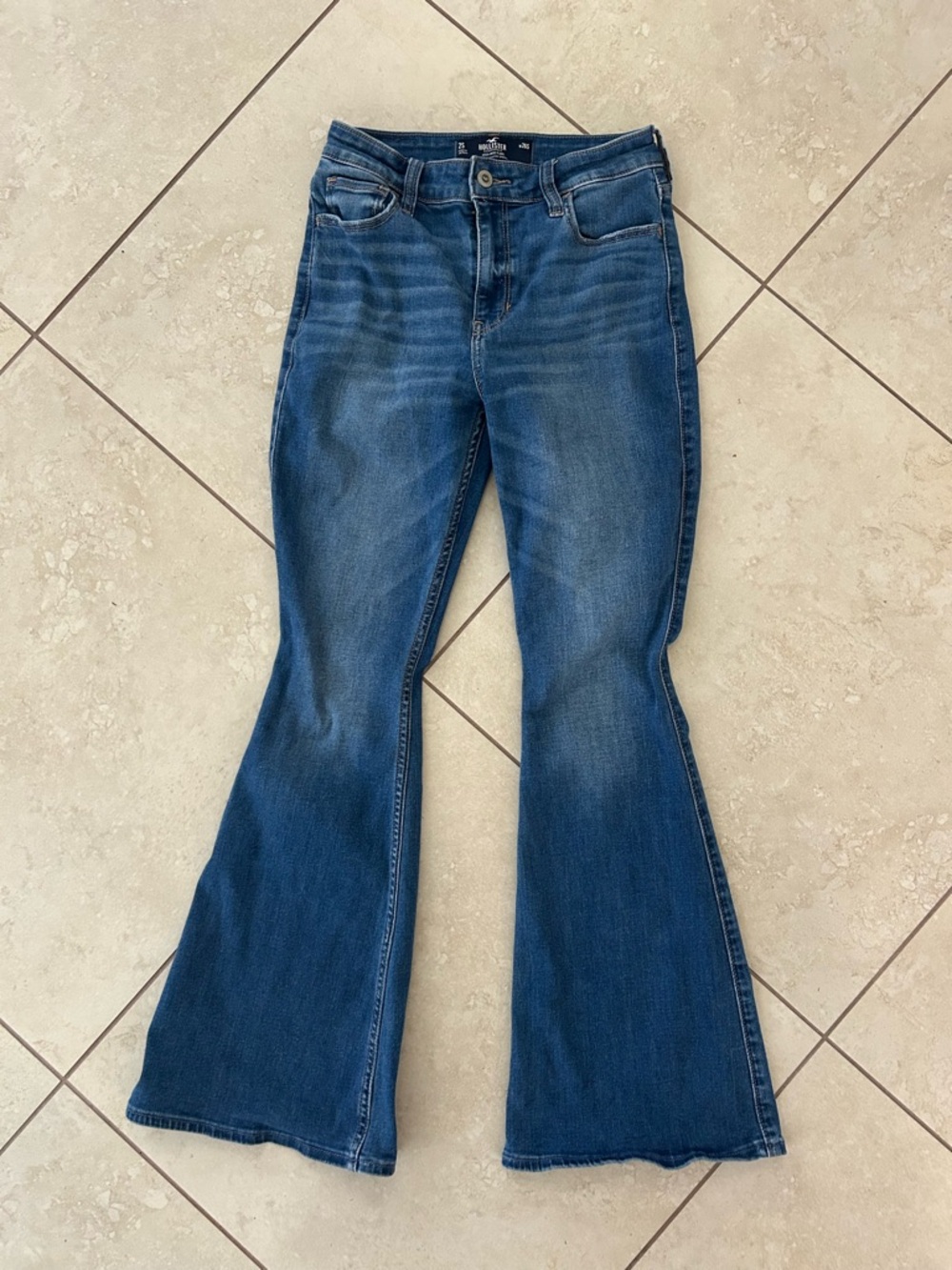 Hollister Women's Flare Jeans in Blue Mid Wash